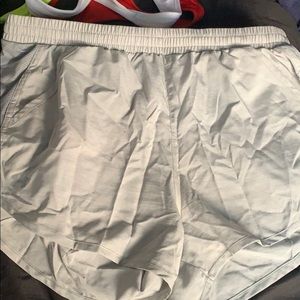 Gray under armor shorts.